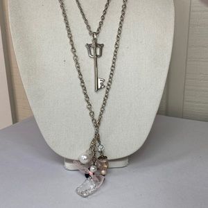Two fun silvertone charm style necklaces